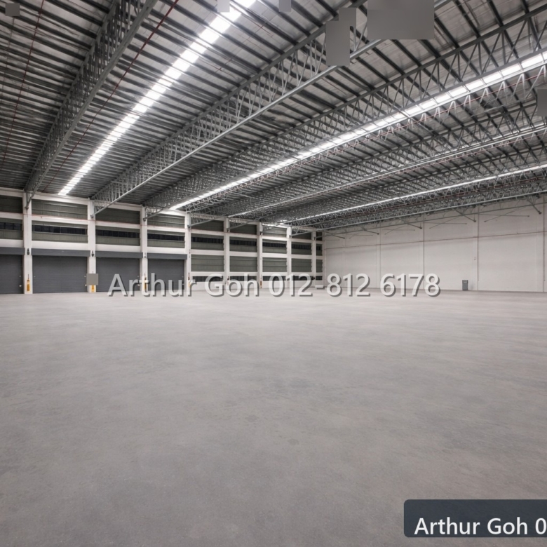 Wide industrial warehouse interior with high roof