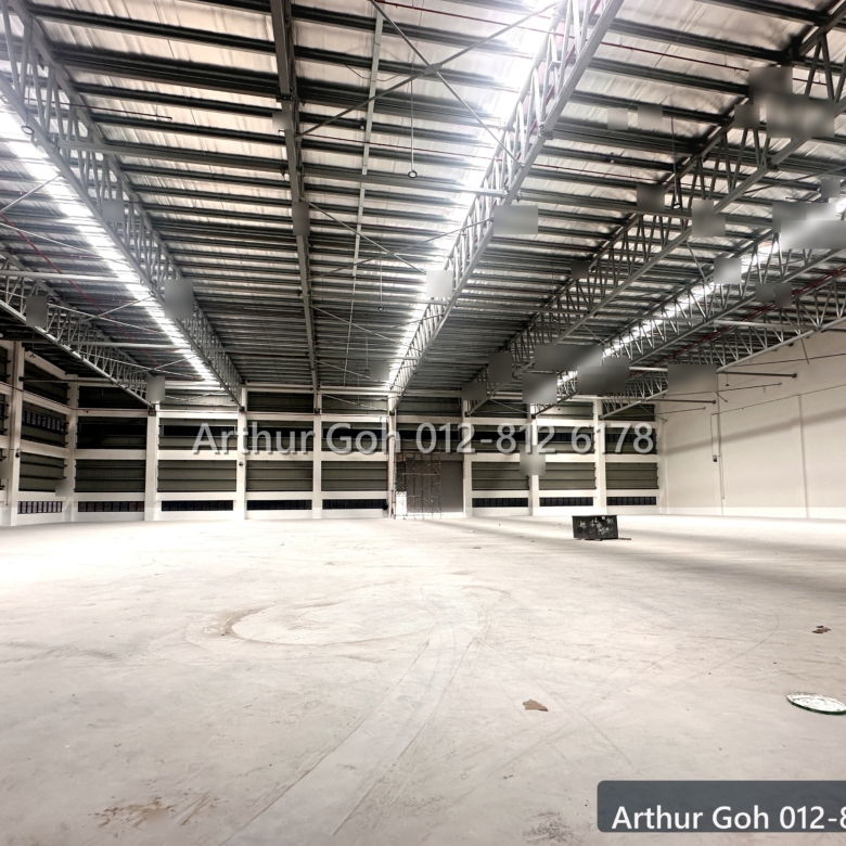 Bright warehouse interior showing structural span