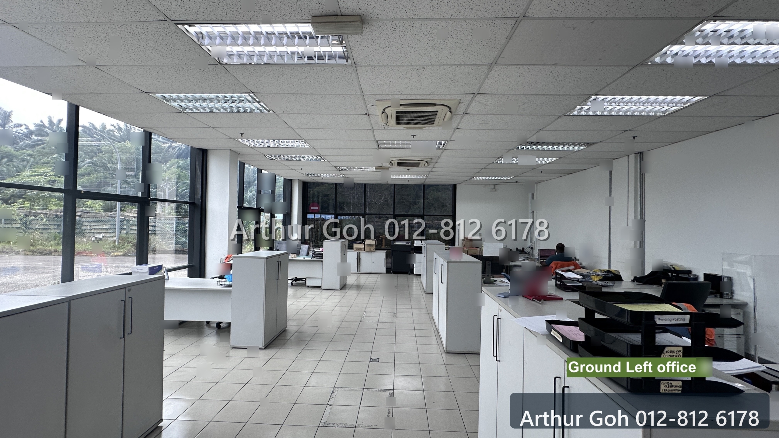 Ground-floor office workspace with windows