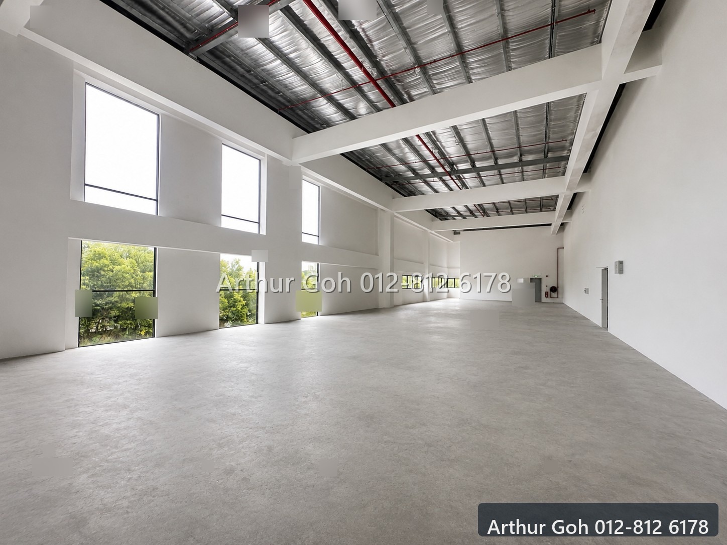 First-floor office interior with high ceiling